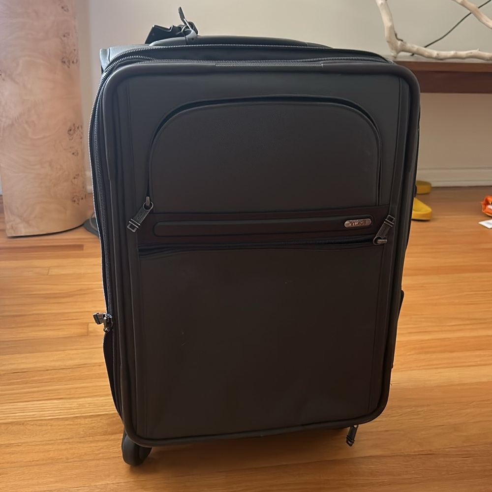 Tumi carry on suitcase